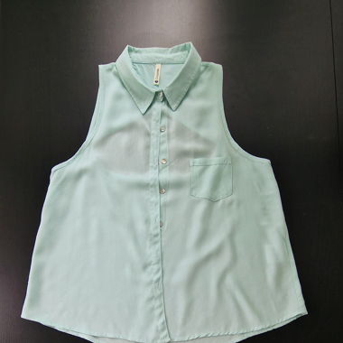 Camicia smanicata Turchese. 