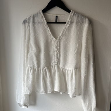 White ruffle blouse