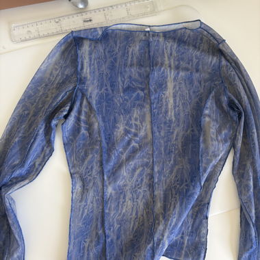 Blusa trasparente blu