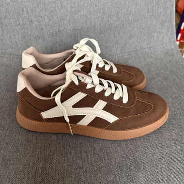 Brown and white sneakers