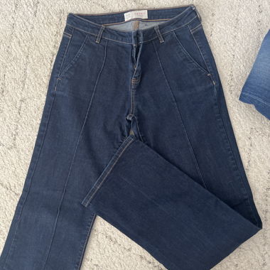 Jeans con tasche laterali