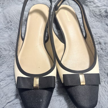 Black and cream slingback heels