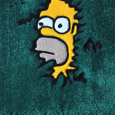 Getufteter grüner Teppich mit Homer-Simpson-Motiv