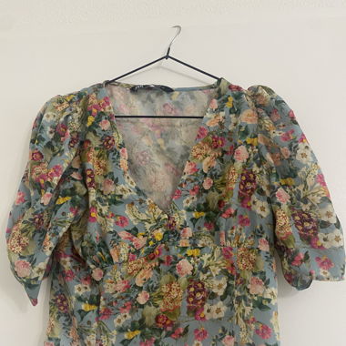 Joli top de taille 34 ( XS )