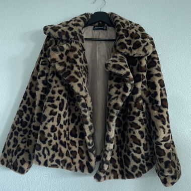 Manteau fausse fourrure léopard