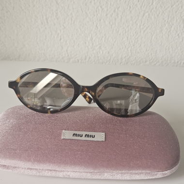 Lunettes de soleil Miu Miu