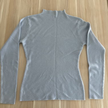 Light blue ribbed mock-neck sweater