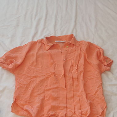 Geraffelte orange Bluse kurzarm 