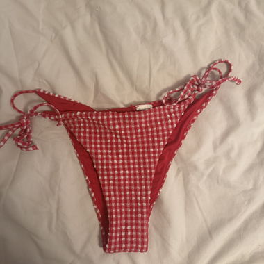 Slip bikini a quadri rosso e bianco
