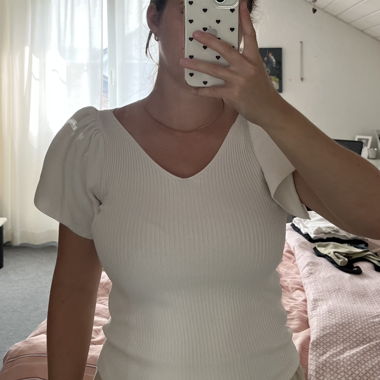 T-shirt blanc à manches larges