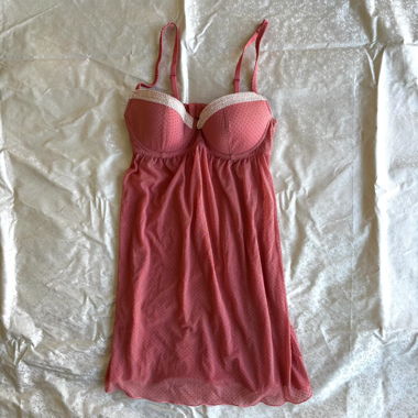 “Engineer” pink mesh mini dress with bow detail