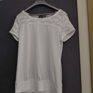 Blusa bianca con pizzo da donna