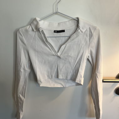 Top corto a coste Zara