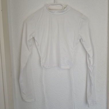 Top bianco a maniche lunghe