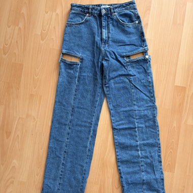 Pantaloni in denim con tagli