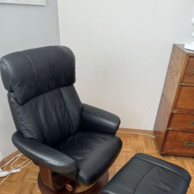 Fauteuil relaxe en cuir avec repose pieds