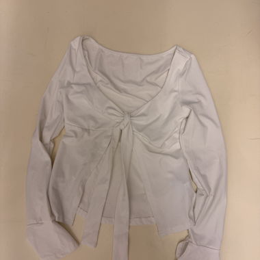 Blouse blanche à manches longues avec lien