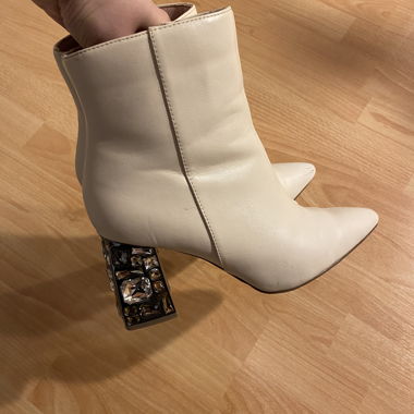 Beige heeled ankle boots