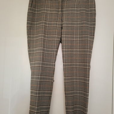 Pantaloni a quadri beige e neri