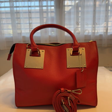 Danier Handtasche rot