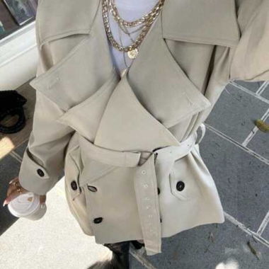 Beige trench coat with belt