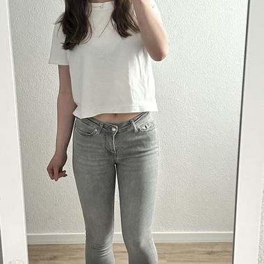 Graue Skinny Jeans