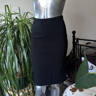 Black knee-length pencil skirt