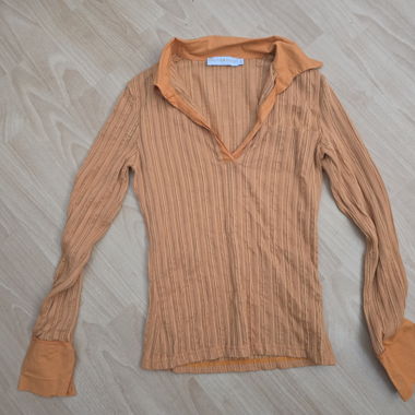 Top a coste arancione maniche lunghe