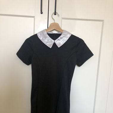 Black A-line dress with white collar