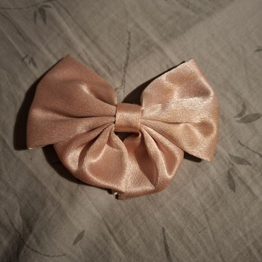 Noeud rose pour cheveux