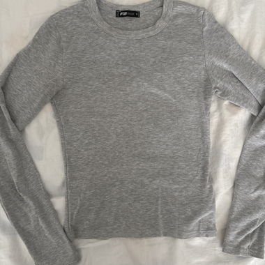 Top a maniche lunghe grigio NEW YORKER