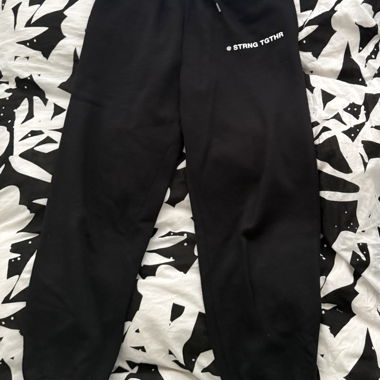 Black sweatpants with print