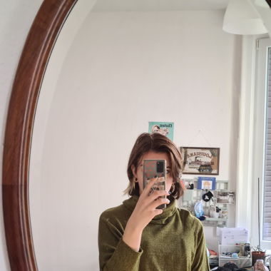 Khaki turtleneck sweater
