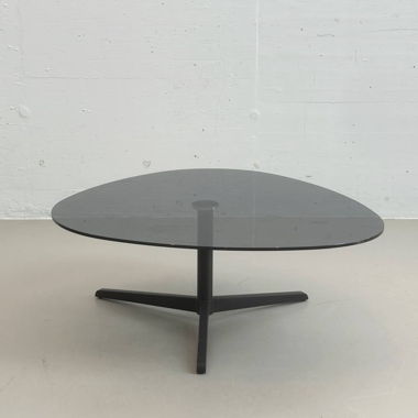 Coffee table in smoked glass with postmodern design