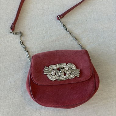 Pink crossbody bag with chain