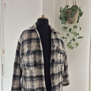 Giacca bouclé a quadri beige e nera