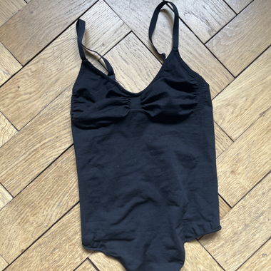 Black bodysuit with spaghetti straps