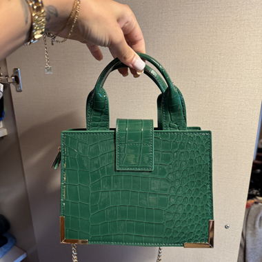 Sac à main vert effet croco
