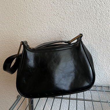 Schwarze Schultertasche