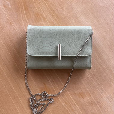 Small chic turquoise handbag
