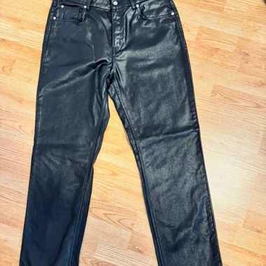 Pantaloni neri rivestiti