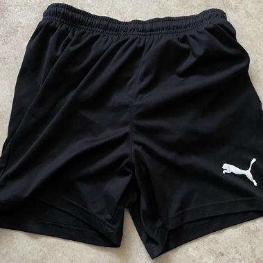 Shorts de sport Puma noirs taille 164