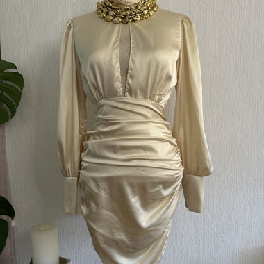 Champagne satin cocktail dress with open back