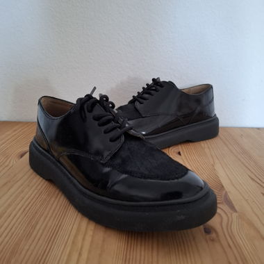 Derbies noir avec poiles
