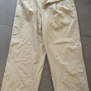 Beige fabric trousers with wide leg