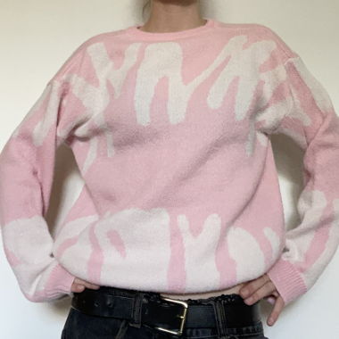 Maglione in maglia rosa con motivo