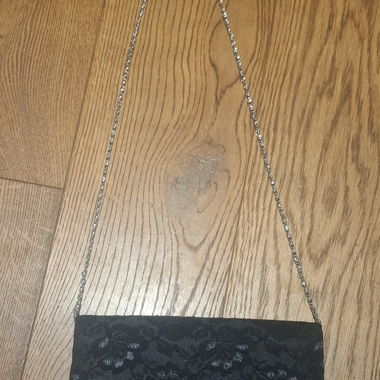 Black evening bag with chain