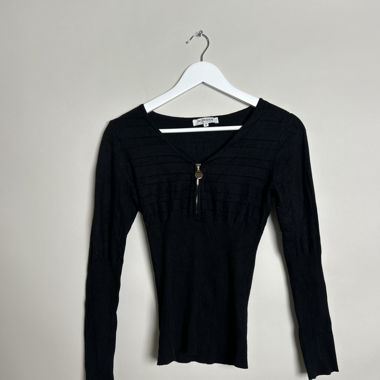 Top nero con zip Morgan
