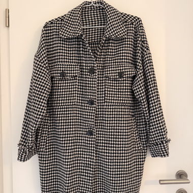 Cappotto bianco e nero