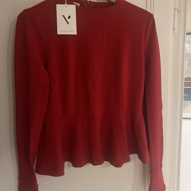 Top peplum rosso a coste, nuovo